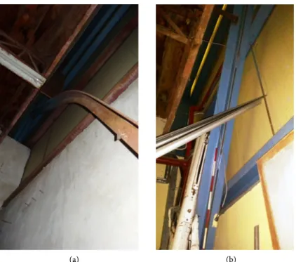 Figure 3. Vertical Λ-type bracing on the southern section of the building: (a) the cor- cor-roded portion with major second-order deformation and (b) the undamaged portion