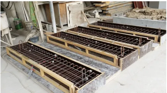 Figure 3-6: Slab cages installed in the wooden forms  