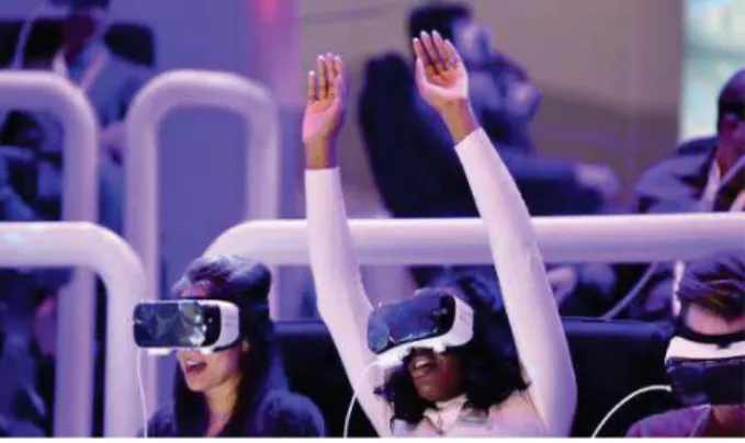 Figure 9: Image from CES 2016 that shows attendees  engaged in a Virtual Reality Roller Coaster experience 