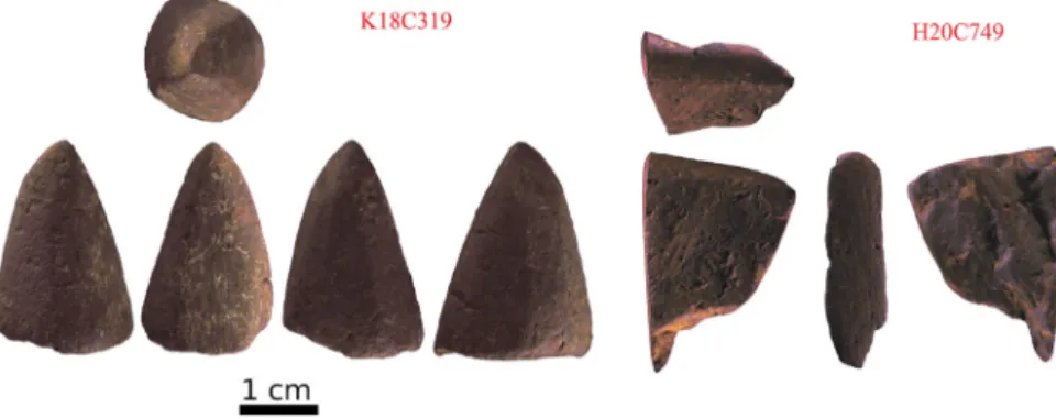 Fig. 2. Combe Sauni ere I: Two faceted hematite-rich blocks showing thin striations, partly smoothed.