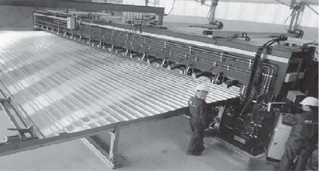 Fig. 1.13: A FSW machine by ESAB for welding of long extrusions of aluminum to fabricate a panel  [3] 