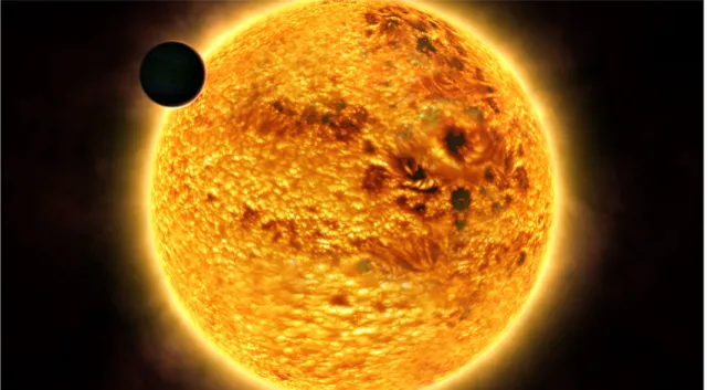 Figure 3.3 – Vue d’artiste du système HD189733. On aperçoit la planète HD189733b commençant un transit ainsi que les nombreuses taches présentes sur l’étoile