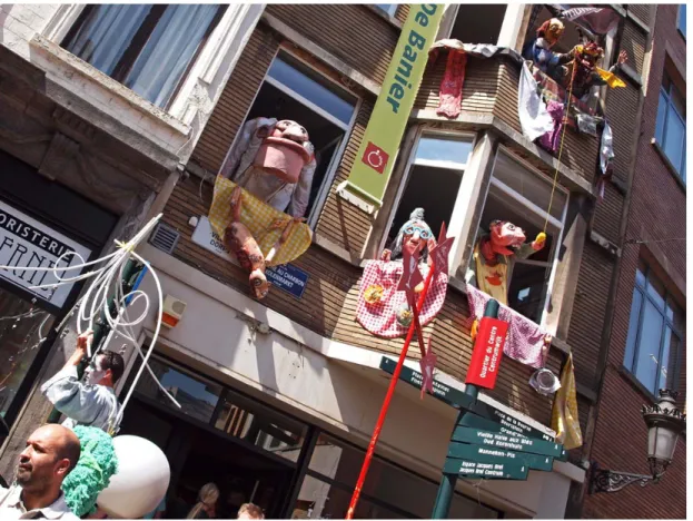 Figure 10.10. &#34;Maurice au balcon&#34; in Zinneke Parade 2010, Brussels City Center    Source: Unattributed photograph, available from http://www.flickr.com/photos/lievensoete/.    With the city’s central avenues and streets closed for the 2.5‐hour spec