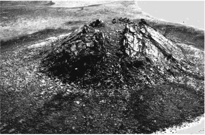 Fig. 2.  22  m-high,  closed-system  pingo  in  Palaeozoic  dolomite  that  is  pervasively  fractured  in  the  N-W  territories (68° 27′ 34″ N; 117° 02′ 39″ W), District of Mackenzie, 70 km S-W of Dolphin and Union Strait  (St Onge &amp; Pissart 1990)