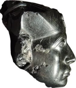 Fig. 5 : Visage d’une statue probablement  composite de Sésostris III. Obsidienne. H. 10,5 cm