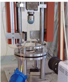 Fig. 9 Drop tower test setup for rubber impact on composite plates