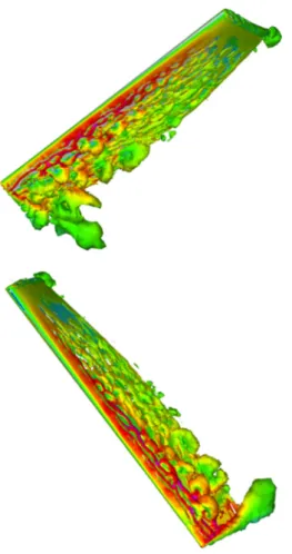Fig. 16 Vorticity isosurfaces colored by flow speed at two instants during the stroke cycle