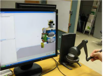 Figure 2.6 – Experimental setup: a human operator uses a PHANToM Desktop device to lift a virtual object in collaboration with a virtual robotic partner.
