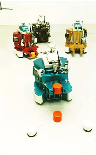 Figure 9 : Les quatre robots IS Robotics R2e utilisés par D. Goldberg et M.J. Mataric (D'après [Goldberg  99]) 