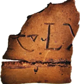 Fig.  1.  Plaque  de  bron e  de  Giuleşti,  avec  les  restes  d’une  inscription  latine  (recto)  (© MMB, inv
