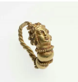 Figure 3: Hoop earring terminating in the head of a maenad, Greek, Hellenistic Period, about 250–160 B.C