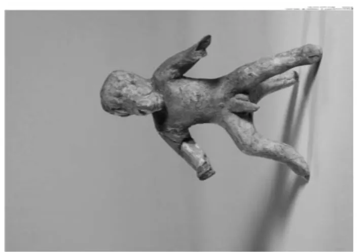 Illustration 6. Inédite.Figurine à corps humain et à tête simiesque. Béotie, époque classique