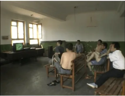 Figure 7: West of the Tracks (2003) – workers in Shenyang Smelting Factory are watching porn videos.