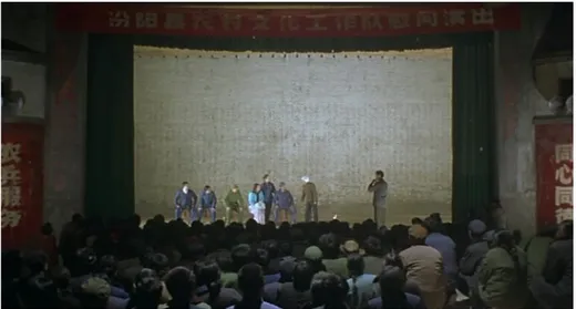Figure 3: Platform (2000) – Workers of the state-owned troupe are performing The Train to Shaoshan.