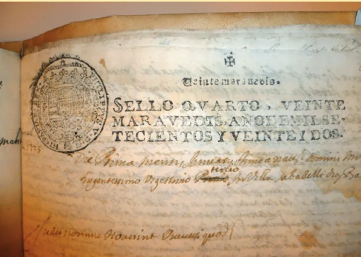 Figura 1. Detall de la capçalera d’un paper oficial segellat del 1722 (regnat de Felip V) en el qual es van escripturar uns capítols matrimonials a  la vila de Sabadell, l’any 1723