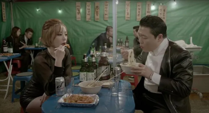 Figure 9 PSY and Ga In eating in a Korean street restaurant 
