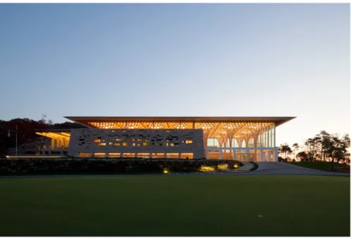 Figure 2: External view of the Nine Bridges Country Club designed by Shigeru Ban. From this picture emerges the structural system based on a  regular layout of timber columns that support the big roof and strongly define the internal spaces