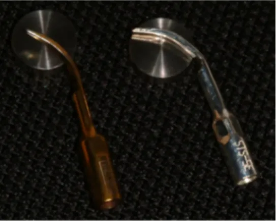 Figure 1. Photograph of conventional steel tip and copper alloy silver-plated tip on grade IV  unalloyed titanium discs