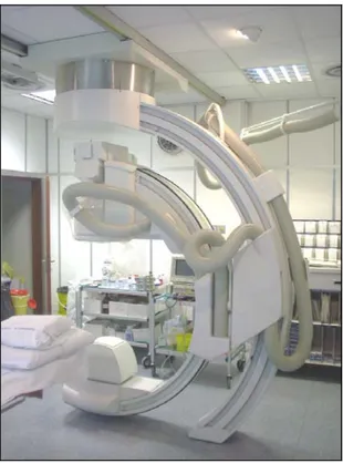 Figura 1.9  Apparecchiatura per angiografia, usata per gli interventi.   La struttura è la stessa per i vari sistemi di acquisizione