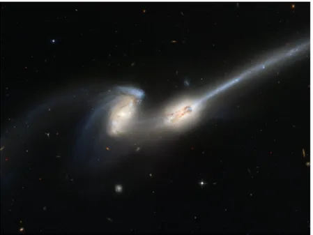 Figura 4.3: Merging di due galassie NGC 4676 chiamato anche ”i topi” a causa delle loro ”code” di stelle e gas