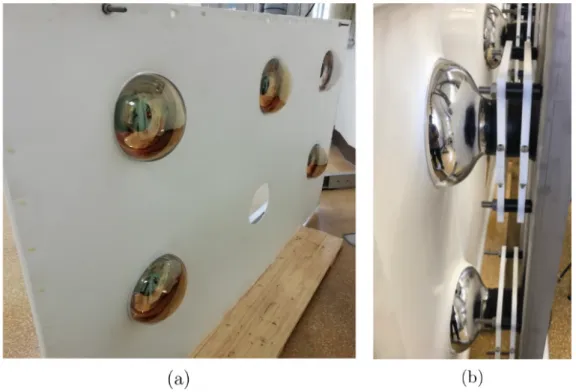 Figure 3.13: Photos of the nVeto structure prototype with the five PMTs and the reflector panel mounted