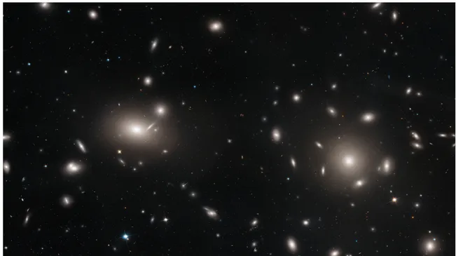 Figure 1.1: Hubble Space Telescope mosaic image of the Coma cluster of galaxies ( Madrid et al