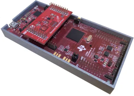 Figure 2.3: BOOSTXL Sensors BoosterPack assembled with the TI LaunchPad inserted in a 3D printed case.