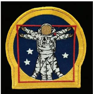 Fig. 1: La patch dell’Uomo del Cosmo tra tre stelle  sulla tuta spaziale degli astronauti della NASA