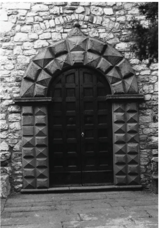 Fig. 1. Portale datato 1539 della chiesa di San Sebastiano di Villagrossa (Calice al Cornoviglio,  La Spezia)