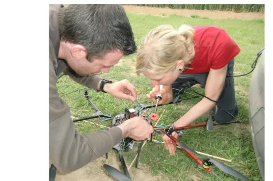Figure 2-2: UAV-system onsite repair during one of the first field campaigns, Rheinbach, 18 May 2011