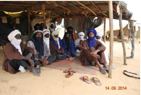 Figure  1:  A group of male Bellah-Iklan under the tent of Ahiyou Intaougat on 14/09/2014 in  Abala