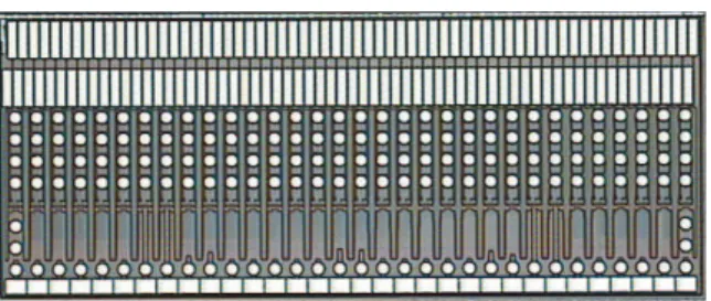 Fig. 6. Photograph of the Switcher3.1 chip. The central part with the bump bond pads has a size of 5.8×1.24 mm 2 