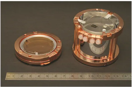 Figure 2.2: An opened detector module. On the left the silicon-on-sapphire light absorber with thermometer