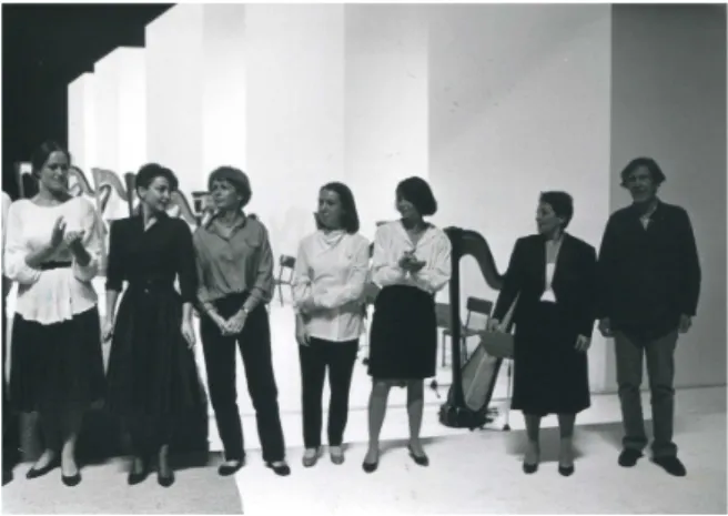 Fig. 16 : Image showing (from right to left) John Cage, Brigitte  Sylvestre and her ensemble of harpists, undated, Folder  Section Son, 1985 — Fonds Biennale de Paris 1959–1985, © INHA-collection  Archives de la critique d'art.