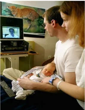 Figure 1 Videoconferencing between  parents in their home and the midwife  at the maternity ward (photo Susanne  Lindholm, adapted and reprinted with  permission)