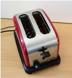 Figure 12: the toaster showing the red light of the arduino reflected  insider, which was interpreted as if it was turned on