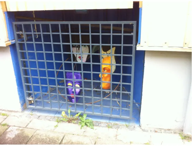 Figure 3: Behind bars. Public art (and, perhaps, an image of life) in the Seved area. 