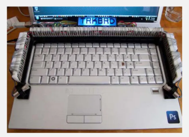 Figure 8: TRKBRD installed on top of laptop  keyboard, turned ON, and functioning  normally