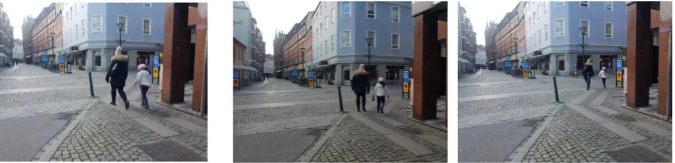 Figur 15-17. En fotgängare med ett barn som visar tydligt hur de följer de större gatstenarna och hur det påverkar deras         rörelsemönster