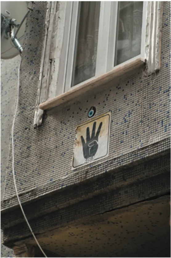 Figure 3. Rabbi’ah sign on a residential building in Tophane. Photo credit: Onur Ekmekçi