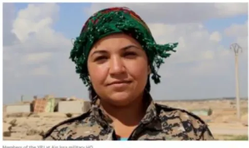 Figure 2: Kurdish female fighter, The Guardian, Photograph: Mark Townsend/The  Observer 