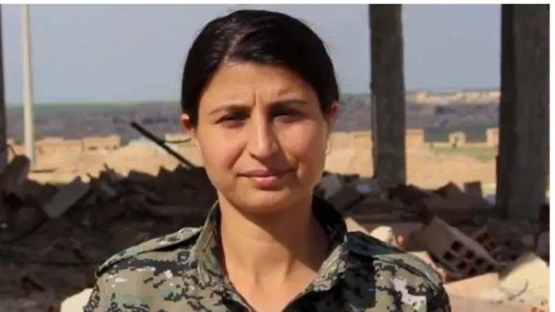 Figure 3: Kurdish female fighter, The Guardian Photograph: Mark Townsend/The  Observer 