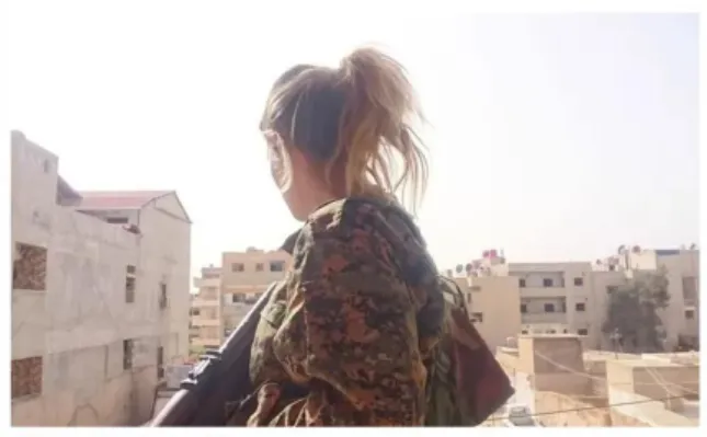 Figure 4: Young British Woman, member of YPJ, The Guardian, Photograph: Collect 