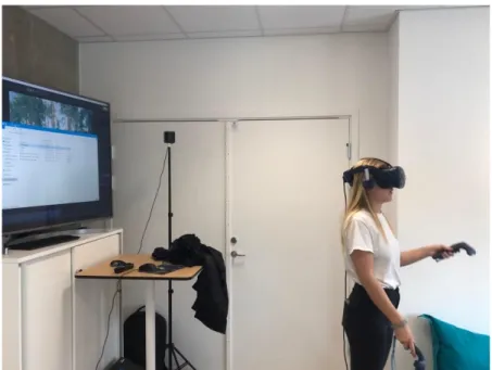 Figure 9. Participant using the prototype with HTC-vive station at the BIMobject office