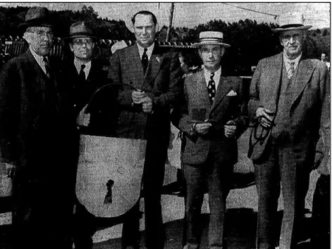 Figure 1.5. The 1938 dedication ceremony for the Big Thompson Canyon highway, with  Governor Teller Ammons (second from right with key) and engineer Charles Vail (far right)