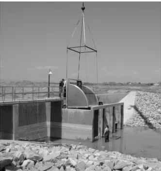Figure 2.  One of three gates on the Greeley #2 canal is re-installed during the  spring of 2007 following a repair that was accomplished over the winter when the 