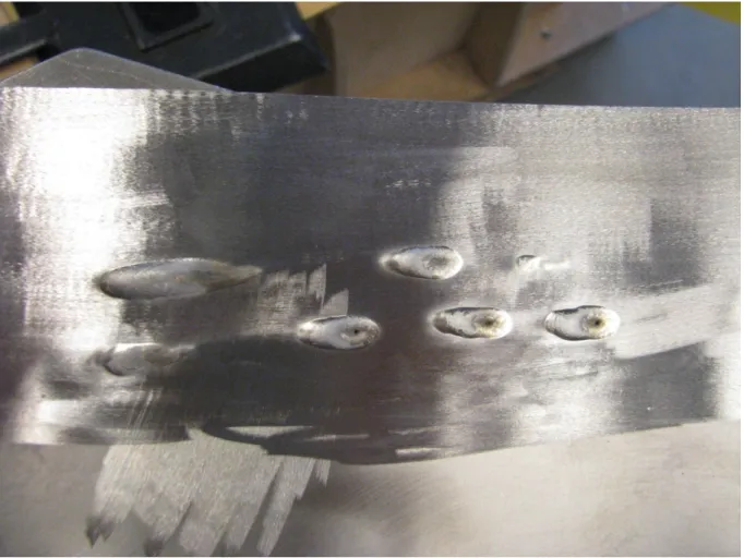 Figure 2 shows us the welds made in area B from a perpendicular angle. The two welds placed to the  right are the welds that are not cracked