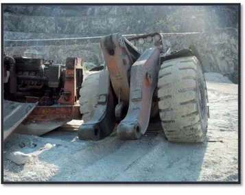 Figur 11.  Lastmaskinens kvarvarande däck efter uttransport  ur tunneln 