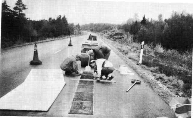 Figure 2. Placing of test slabs in existing pavement.