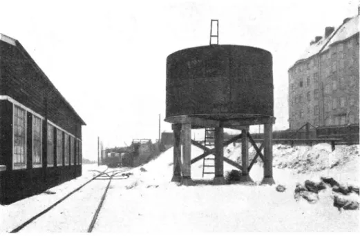 Fig.  11.  Behållare  för  sulfitlut  i  Stockholm.  Kymd  c:a  30  m3,  d.  v.  s.  två  järnvägstankvagnar.